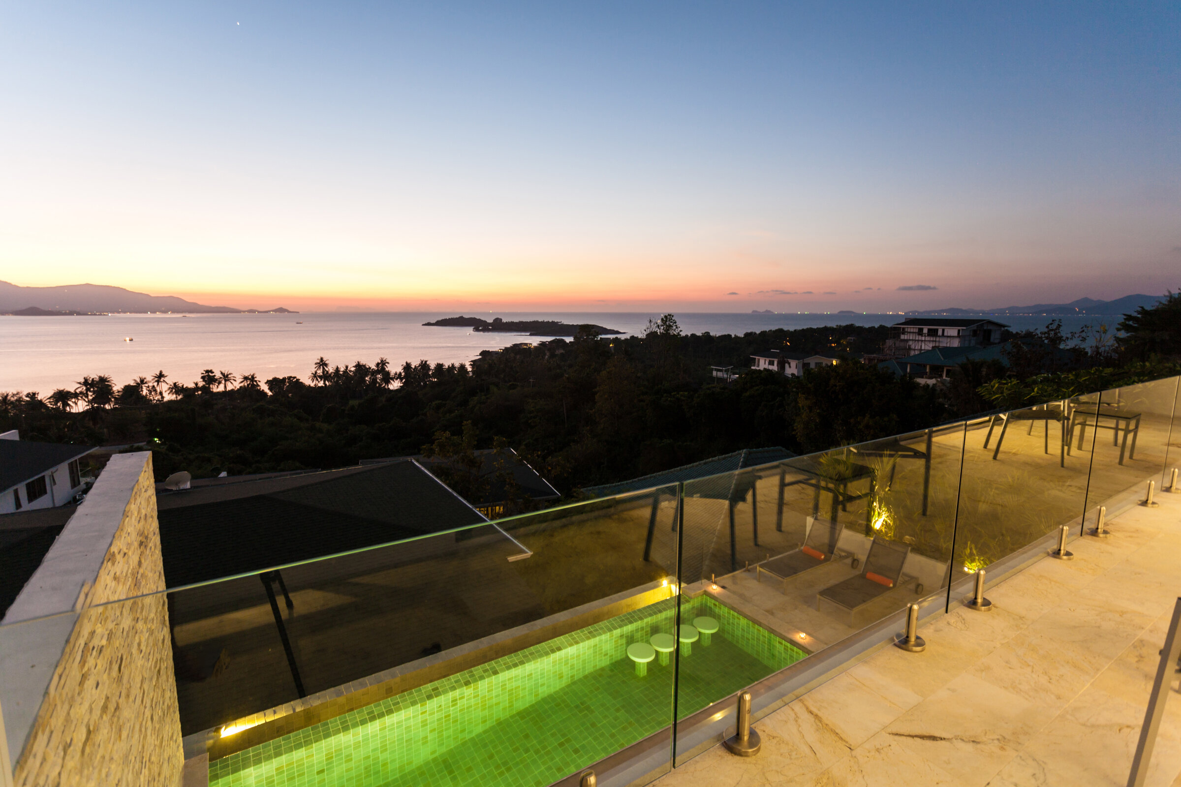 Villa Daizo modern kitchen with island and garden views